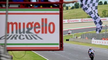 Ducati Italian rider Francesco Bagnaia rides to cross the finish line of the the Italian MotoGP race at Mugello on June 2, 2024. 
Marco BERTORELLO / AFP