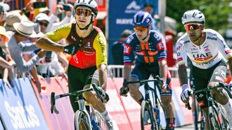 Cofidis rider Bryan Coquard from France (L) reacts after winning stage 4 of the Tour Down Under cycling race in Adelaide on January 24, 2025. 
Brenton Edwards / AFP