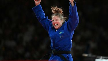 Slovenia's Andreja Leski (Blue) reacts after beating Mexico's Prisca Awiti Alcaraz in the judo women's -63kg gold medal bout of the Paris 2024 Olympic Games at the Champ-de-Mars Arena, in Paris on July 30, 2024.  
Luis ROBAYO / AFP