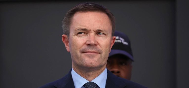 UCI President David Lappartient stand with medal winners on the podium following the team time trial mixed relay cycling event during the UCI 2025 Road World Championships, in Kigali, on September 24, 2025. 
Anne-Christine POUJOULAT / AFP