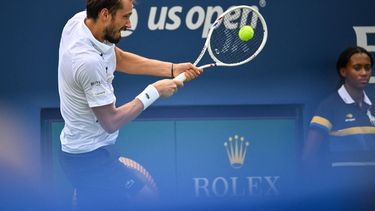 Russia's Daniil Medvedev hits a return to France's Arthur Rinderknech during their men's singles third round tennis match on day six of the US Open tennis tournament at the USTA Billie Jean King National Tennis Center in New York City on September 4, 2026. 
ANGELA WEISS / AFP