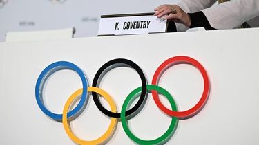 A IOC staff member displays the name of newly-elected Zimbabwean Kirsty Coventry before her press conference as part of the 144th IOC Session on the day of the election of the President of the International Olympic Committee (IOC), in Costa Navarino, Greece on March 20, 2025. Zimbabwe's Kirsty Coventry became the first woman and the first African to be elected president of the International Olympic Committee on March 20, 2025.
Fabrice COFFRINI / AFP