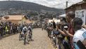 Residents gather to look at cyclists competing during the final stage of the 16h Tour du Rwanda on 25 february 2024, in Kigali. Israel Premier Tech’s British rider Joseph Blackmore, won the Tour of Rwanda which ended on Sunday in the capital Kigali. 
Guillem Sartorio / AFP
