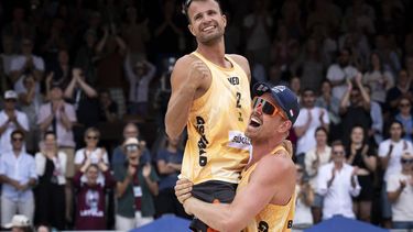 epa12219935 Netherlands's Stefan Boermans, right, and Netherlands's Yorick De Groot, left, celebrate their victory against Brazil's George Souto Maior Wanderley and Brazil's Andre Loyola Stein, during the Volleyball World Beach Pro Tour Elite16 men's third place Final match, in Gstaad, Switzerland, 06 July 2025.  EPA/ANTHONY ANEX