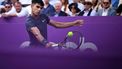 Spain's Carlos Alcaraz returns against Argentina's Francisco Cerundolo during their men's singles round of 32 match at the Cinch ATP tennis Championships at Queen's Club in west London on June 18, 2024. 
Ben Stansall / AFP