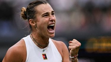 Belarus's Aryna Sabalenka celebrates after winning a point against Belgium's Elise Mertens during their women's singles fourth round tennis match on the seventh day of the 2025 Wimbledon Championships at The All England Lawn Tennis and Croquet Club in Wimbledon, southwest London, on July 6, 2025. 
Kirill KUDRYAVTSEV / AFP