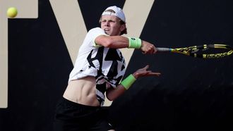 epa09542299 Dutch tennis player Jesper de Jong returns a ball to the Argentine Facundo Mena, during a match for the semifinals of the ATP Tennis Challenger tournament, at the Carmel Club in Bogota, Colombia, 23 October 2021.  EPA/Carlos Ortega