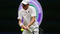 Italy's Jannik Sinner reacts as he practices with Serbia's Novak Djokovic on No. 1 Court at The All England Lawn Tennis and Croquet Club in Wimbledon, southwest London, on June 25, 2026, ahead of the 2026 Wimbledon Championships. 
Adrian Dennis / AFP