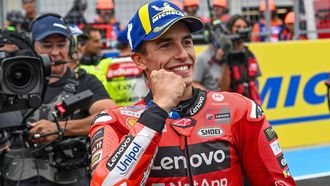 Ducati Lenovo Team's Spanish rider Marc Marquez celebrates his victory after the sprint race ahead of motorcycle Hungarian Moto GP Grand Prix at the Balaton Park circuit in Balatonfokajar, Hungary, on August 23, 2025.  
ATTILA KISBENEDEK / AFP