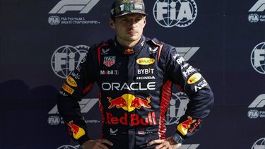 2023-08-26 16:34:06 Red Bull Racing's Dutch driver Max Verstappen poses after taking pole position in the qualifying session at The Circuit Zandvoort, ahead of the Dutch Formula One Grand Prix, in Zandvoort on August 26, 2023. 
SIMON WOHLFAHRT / AFP