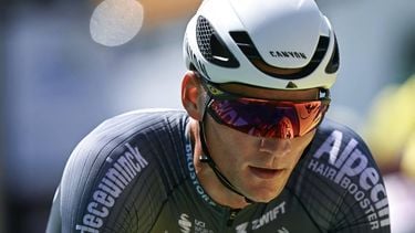 Alpecin - Deceuninck team's Dutch rider Mathieu van der Poel cycles to the finish line of the 13th stage of the 112th edition of the Tour de France cycling race, 10.9 km individual time trial between Loudenvielle and Peyragudes, in the Pyrenees mountains of southwestern France, on July 18, 2025. 
Loic VENANCE / AFP