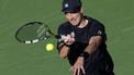 epa11950559 Botic Van de Zandschulp of the Netherlands in action against Novak Djokovic of Serbia during their men's second round match at the BNP Paribas Open tennis tournament in Indian Wells, California, USA, 08 March 2025.  EPA/JOHN G. MABANGLO