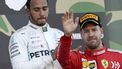 epa07916937 Second placed German Formula One driver Sebastian Vettel (R) of Scuderia Ferrari walks past third placed British Formula One driver Lewis Hamilton of Mercedes AMG GP on the podium of the Japanese Formula One Grand Prix in Suzuka, Japan, 13 October 2019.  EPA/FRANCK ROBICHON