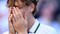 Italy's Jannik Sinner reacts to beating Germany's Alexander Zverev (R) for winning their men's singles final tennis match on the fourteenth day of the 2026 Wimbledon Championships at The All England Lawn Tennis and Croquet Club in Wimbledon, southwest London, on July 12, 2026. 
Kirill KUDRYAVTSEV / AFP
