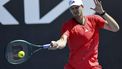 epa11822916 Hubert Hurkacz of Poland in action against Tallon Griekspoor of the Netherlands during their Men's first round match during the Australian Open tennis tournament in Melbourne, Australia, 14 January 2025.  EPA/ROLEX DELA PENA