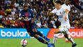 Paris Saint-Germain's French midfielder Lassana Diarra (L) vies for the ball with Caen's French midfielder Jessy Deminguet (R) during the French L1 football match between Paris Saint-Germain and Caen on August 12, 2018 at the Parc des Princes, in Paris. 
GERARD JULIEN / AFP