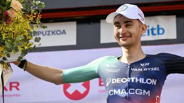 Team Decathlon CMA CGM's French rider Paul Seixas celebrates on the podium after winning the fifth stage of the Basque Country's Itzulia cycling tour, a 176.2 km race starting and finishing in Eibar, on April 10, 2026.  Seixas is the overall race leader.
ANDER GILLENEA / AFP