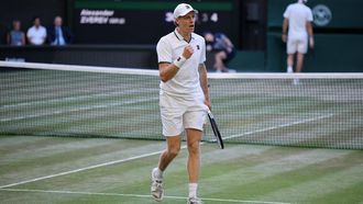 Italy's Jannik Sinner celebrates winning a point against Germany's Alexander Zverev during their men's singles final tennis match on the fourteenth day of the 2026 Wimbledon Championships at The All England Lawn Tennis and Croquet Club in Wimbledon, southwest London, on July 12, 2026. 
Henry NICHOLLS / AFP