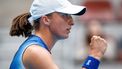 2023-10-07 14:47:28 epa10904699 Iga Swiatek of Poland reacts during her semi-final match against Coco Gauff of the USA in the China Open tennis tournament in Beijing, China, 07 October 2023.  EPA/MARK R. CRISTINO