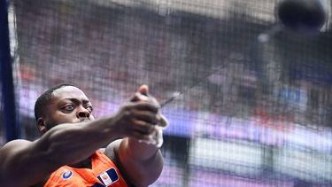 Netherlands' Denzel Comenentia competes in the men's hammer throw qualification of the athletics event at the Paris 2024 Olympic Games at Stade de France in Saint-Denis, north of Paris, on August 2, 2024. 
Kirill KUDRYAVTSEV / AFP
