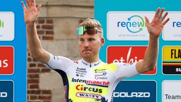 Intermarche-Circus-Wanty Dutch rider Mike Teunissen (C) celebrates on the podium after winning Stage 3 of the Renewi Cycling Tour, from Aalter to Geraardsbergen (171,2km), in Geraardsbergen on August 25, 2023. The Renewi Cycling Tour takes place from August 23-27, 2023.
KURT DESPLENTER / Belga / AFP