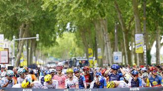 epa11473851 Riders get ready at the start line ahead of the 13th stage of the 2024 Tour de France cycling race over 165km from Agen to Pau, France, 12 July 2024.  EPA/KIM LUDBROOK