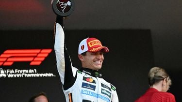 McLaren's British driver Lando Norris lifts the trophy on the podium after winning the Formula One Monaco Grand Prix at the Circuit de Monaco, on May 25, 2025. 
Christophe SIMON / AFP