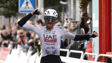 epa11251701 US rider Brandon McNulty of UAE Emirates team celebrates his victory in the Miguel Indurain-Laboral Kutxa 2024 one-day cycling race in Estella, Spain, 30 March 2024.  EPA/Villar Lopez