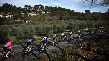 The pack rides during the 6th stage of the Paris-Nice cycling race, 179.3 km between Barbentane and Apt, on March 13, 2026. 
Anne-Christine POUJOULAT / AFP