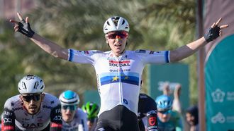 Team Soudal Quick-Step Belgian rider Tim Merlier celebrates as he crosses the finish line to win the first stage of the AlUla Tour cycling race from al-Manshiyah Train station to the al-Manshiyah Train Station, a 142.7 kilometers tour, in Alula, on January 28, 2025. 
Loic VENANCE / AFP