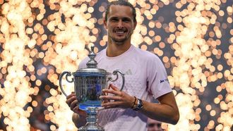 Germany's Alexander Zverev holds the trophy after defeating USA's Ben Shelton in the men's singles final tennis match on day fifteen of the US Open tennis tournament at the USTA Billie Jean King National Tennis Center in New York on September 13, 2026. 
ANGELA WEISS / AFP