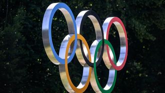 This photograph shows the Olympic rings prior to an IOC executive commission meeting ahead of IOC session, at the Olympic House in Lausanne, on June 22, 2026. 
Fabrice COFFRINI / AFP