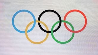 The photograph shows Olympic Rings during a ceremony to mark one year until the start of Milano Cortina Olympics in Strehler Theatre, in Milan, on February 6, 2025, ahead of the Milano Cortina 2026 Winter Olympic and Paralympic Games. 
MARCO BERTORELLO / AFP