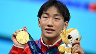 Gold medallist and world record holder Japan's Shin Ohashi celebrates following the victory ceremony of the men's 200m breaststroke swimming event during the 2026 Asian Games at the Tokyo Aquatics Centre in Tokyo on September 24, 2026. 
ANDREW CABALLERO-REYNOLDS / AFP