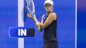 2023-09-04 05:10:13 Poland's Iga Swiatek walks to the baseline during the US Open tennis tournament women's singles round of 16 match against Latvia's Jelena Ostapenko at the USTA Billie Jean King National Tennis Center in New York City, on September 3, 2023. 
COREY SIPKIN / AFP