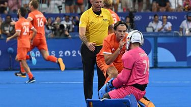 Netherlands' forward #51 Duco Telgenkamp celebrates in the face of Germany's goalkeeper #74 Jean-Paul Danneberg after the men's final field hockey match between Germany and the Netherlands during the Paris 2024 Olympic Games at the Yves-du-Manoir Stadium in Colombes on August 8, 2024. 
ARUN SANKAR / AFP