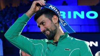 2023-11-19 20:51:41 epa10985350 Novak Djokovic of Serbia celebrates winning his singles finals match against Jannik Sinner of Italy at the Nitto ATP Finals tennis tournament in Turin, Italy, 19 November 2023.  EPA/ALESSANDRO DI MARCO
