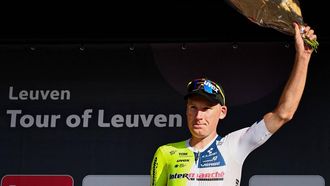 Seocond-placed Dutch Mike Teunissen of Intermarche-Wanty poses on the podium of the one-day cycling road race of Tour of Leuven, Memorial Jef Scherens, in Leuven, on August 15, 2024. 
MAARTEN STRAETEMANS / Belga / AFP