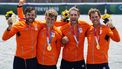 epa09372066 (from left) Dirk Lucas Theodor Uittenbogaard, Abe Wiersma, Tone Wieten and Koen Metsemakers of the Netherlands celebrate after winning gold in the Men's Quadruple Sculls final at the Rowing events of the Tokyo 2020 Olympic Games at the Sea Forest Waterway in Tokyo, Japan, 28 July 2021.  EPA/KIMIMASA MAYAMA