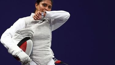 France's Ysaora Thibus reacts after losing against team Canada in the women's foil team round of 8 bout during the Paris 2024 Olympic Games at the Grand Palais in Paris, on August 1, 2024. 
FRANCK FIFE / AFP