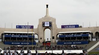 epa06211433 The cauldron at the Los Angeles Memorial Coliseum is lit to honor the announcement that Los Angeles will host the 2028 Olympic Games in Los Angeles, California, USA, 17 September 2017. The LA Coliseum is the only stadium to host two summer Olympics, one in 1932 and again in 1984.  EPA/PAUL BUCK