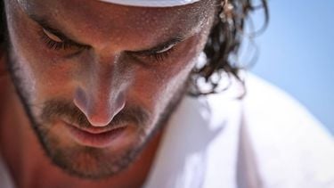 Greece's Stefanos Tsitsipas reacts as he plays against France's Valentin Royer during their men's singles first round tennis match on the first day of the 2025 Wimbledon Championships at The All England Lawn Tennis and Croquet Club in Wimbledon, southwest London, on June 30, 2025. 
Kirill KUDRYAVTSEV / AFP