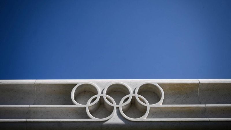The Olympic Rings logo is pictured in front of the headquarters of the International Olympic Committee (IOC) in Lausanne on March 18, 2020, as doubts increase over whether Tokyo can safely host the summer Games amid the spread of the COVID-19. Olympic chiefs acknowledged on March 18, 2020 there was no 