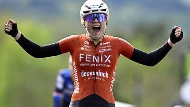 Fenix-Deceuninck team's Dutch rider Puck Pieterse celebrates after winning the women's 