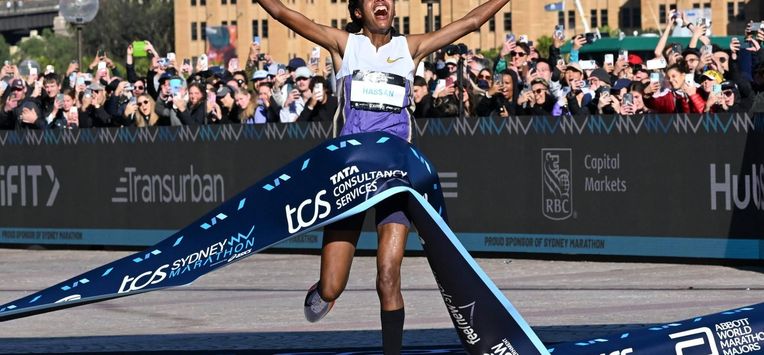 Netherlands's Sifan Hassan crosses the finish line first in the 2025 Sydney Marathon, crossing the iconic Harbour Bridge on August 31, 2025. 
Saeed KHAN / AFP