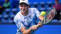 2023-10-18 04:41:03 Poland's Hubert Hurkacz hits a return against China's Zhang Zhizhen during their men’s singles match on day three of the ATP Japan Open tennis tournament in Tokyo on October 18, 2023. 
Kazuhiro NOGI / AFP