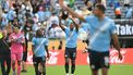 Manchester City's Swiss defender #25 Manuel Akanji (C) greets the fans after winning the FIFA Club World Cup 2025 Group D football match between Italy's Juventus and England's Manchester City at the Camping World stadium in Orlando on June 26, 2025. 
Chandan KHANNA / AFP