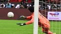 epa12649979 Morocco's goalkeeper Yassine Bounou makes a save during the penalty shootout of the CAF Africa Cup of Nations 2025, semifinal match between Nigeria and Morocco in Rabat, Morocco, 14 January 2026.  EPA/JALAL MORCHIDI