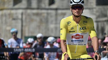 Alpecin - Deceuninck team's Dutch rider Mathieu van der Poel wearing the overall leader's yellow jersey awaits the start of the 7th stage of the 112th edition of the Tour de France cycling race, 197 km between Saint-Malo and Mur-de-Bretagne Guerledan, in Brittany, western France, on July 11, 2025. 
Marco BERTORELLO / AFP