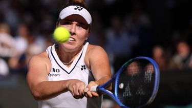 Czech Republic's Linda Noskova returns to Czech Republic's Karolina Muchova during their women's singles final tennis match on the thirteenth day of the 2026 Wimbledon Championships at The All England Lawn Tennis and Croquet Club in Wimbledon, southwest London, on July 11, 2026. 
Henry NICHOLLS / AFP